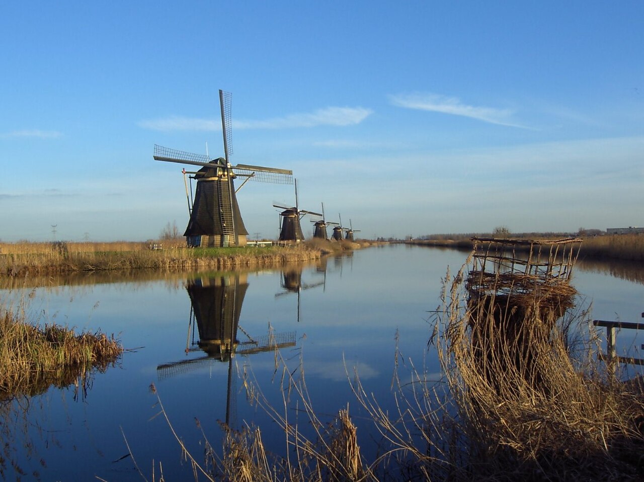 Afbeelding bij: Kinderdijk — negentien molens tegen het water